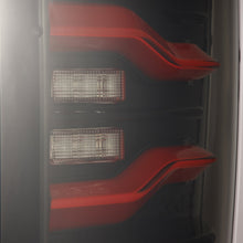Load image into Gallery viewer, 09-18 Ram Truck LUXX-Series LED Tail Lights Black-Red