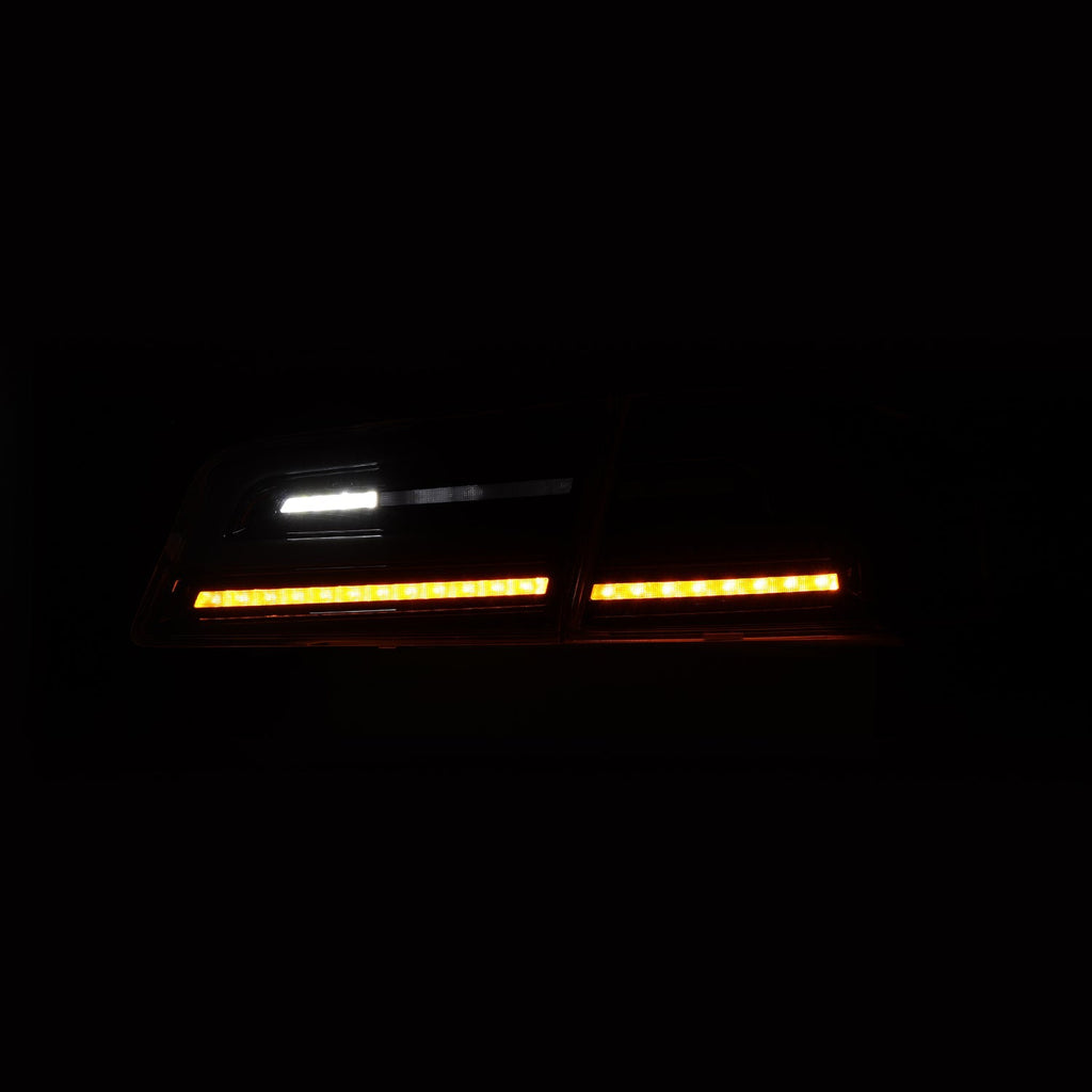 12-21 Tesla Model S LUXX-Series LED Tail Lights Alpha-Black (With Black Trunk Center Piece Replacement)