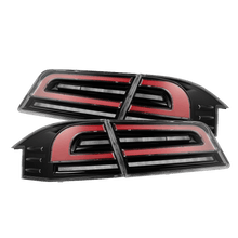 Load image into Gallery viewer, 12-21 Tesla Model S LUXX-Series LED Tail Lights Black Red (With Black Trunk Center Piece Replacement)