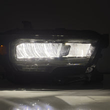 Load image into Gallery viewer, 16-23 Toyota Tacoma LUXX-Series LED Crystal Headlights Alpha-Black