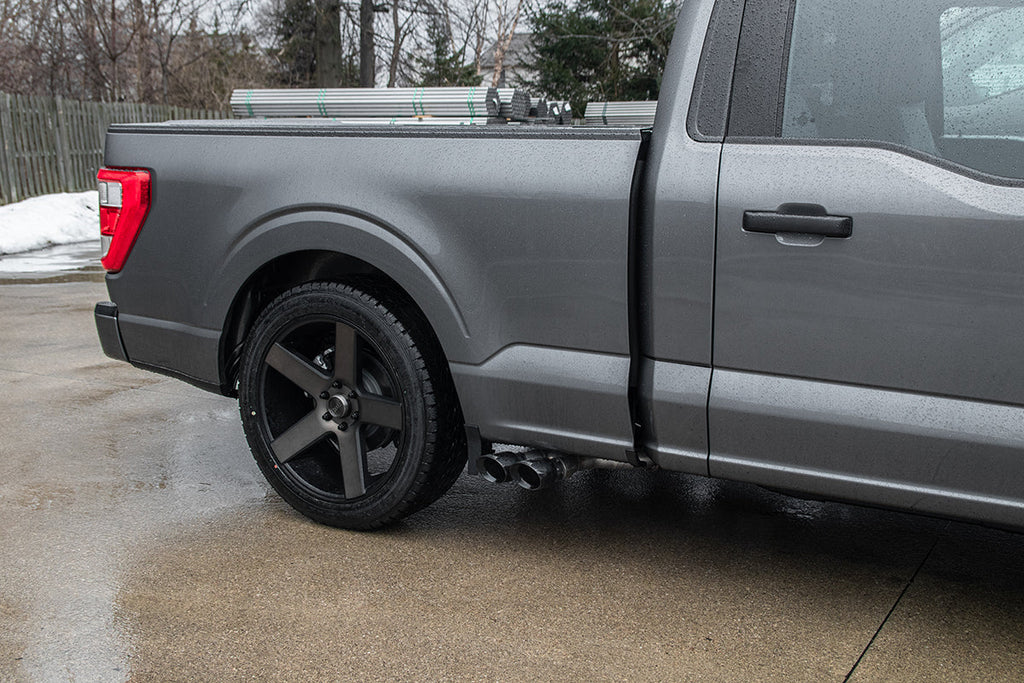 Corsa Performance 3.0 Inch Front of Tire Exit Catback Exhaust System with Twin 3.5 Inch Pro Series Black Tips Sport Sound Level 21-25 Ford F-150 141 Inch Wheel Base (21153BLK)