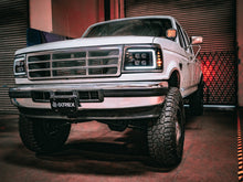 Load image into Gallery viewer, 92-96 Ford F-Series/Bronco NOVA-Series LED Projector Headlights Black