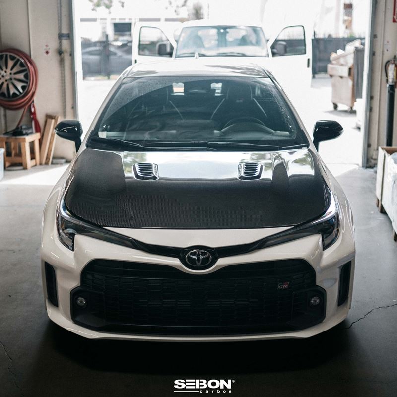 Seibon 2023 Toyota GR Corolla OE-Style Carbon Fiber Hood - Gloss Finish (HD23TYGRCOR-OE)