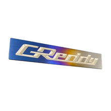 Load image into Gallery viewer, GReddy Titanium Emblem - (105x20mm) (18000201)