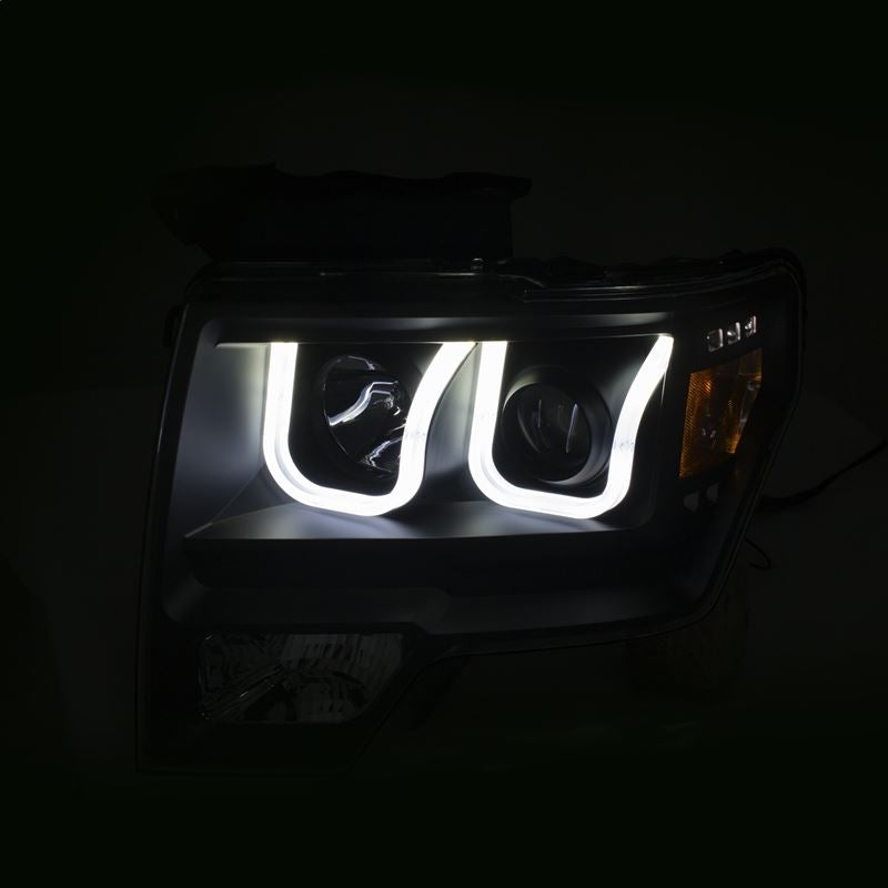 ANZO USA 2009-2014 Ford F-150 Projector Headlights w/ U-Bar Switchback Black w/ Amber (111383)