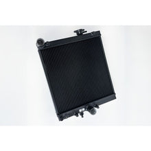 Load image into Gallery viewer, CSF Cooling - Racing &amp; High Performance Division 1/2 Size Black Radiator for 03-07 Mitsubishi Lancer EVO 7/8/9 (7228B)