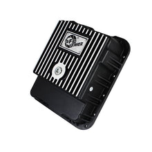 Load image into Gallery viewer, aFe Power Transmission Pan Black w/ Machined Fins (46-70242)