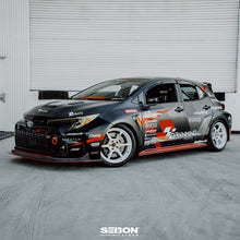 Load image into Gallery viewer, Seibon 2023+ Toyota GR Corolla MB-Style Carbon Fiber Front Lip (FL23TYGRCOR-MB)